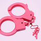 Illustration for article titled Brave Cops Fight Breast Cancer By Arresting People Using Pink Handcuffs